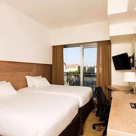 Hilton Garden Claridge Hotell 4*